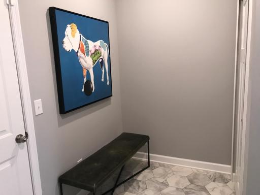 Garage entry is spacious and has closet storage with easy care flooring. Previous home, finishes will vary.