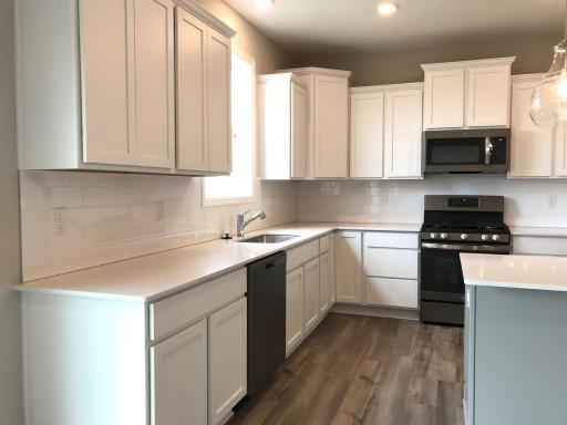 Fantastic counter space, gas range, and slate appliances.jpg