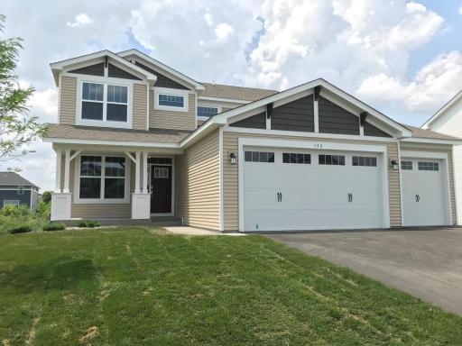 Private back yard with Awesome Views and a great front porch. Insulated garage doors with glass and shake accents.jpg