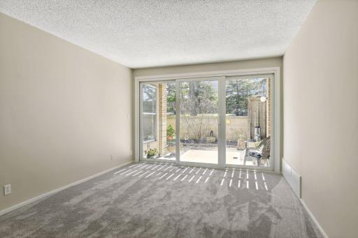 Welcome to this open and bright garden level unit at "The Colony!"