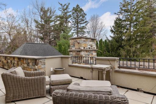 Private terrace off master bedroom overlooking the beautifully manicured, resort-style backyard