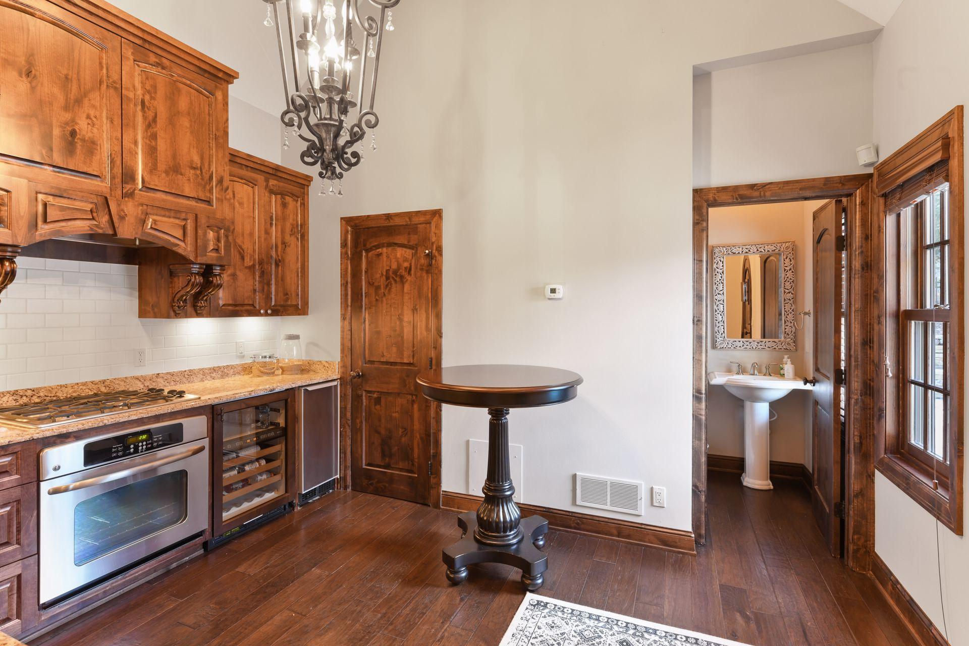 Pool house with kitchen, bath and living space.