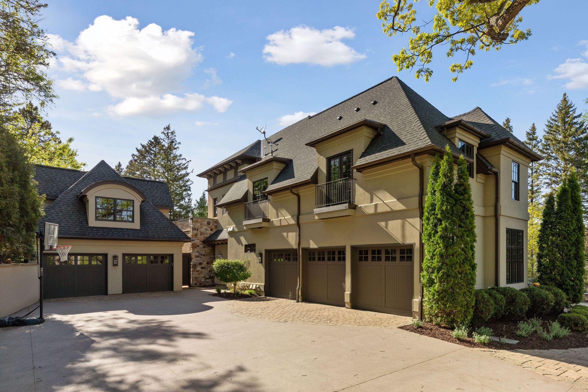 2-car garage has a finished cigar room/bar space above.