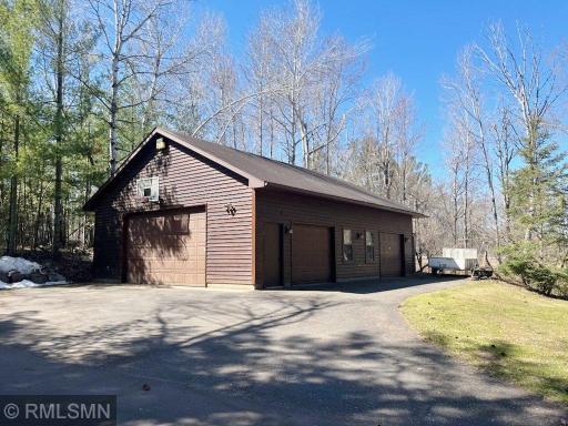 Nice 30 x 40 garage with and 15 x 18 heated workshop area, upper storage plus a 12 x 24 lean too.