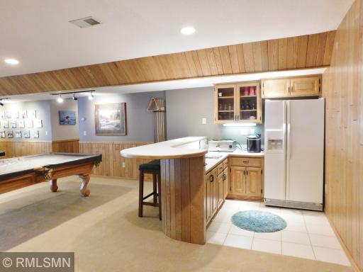 Lower level wet bar for entertaining and fun!