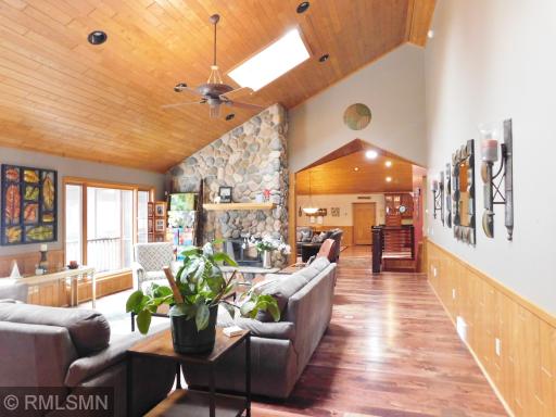 Double sided stone wood burning fireplace.