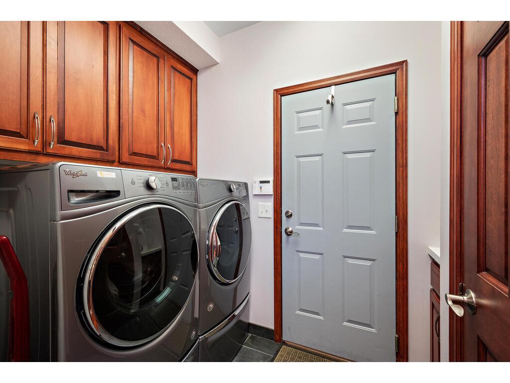 Main level laundry. Washer and Dryer stay with the sale.