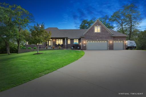 This home rests on just shy of 20 acres in the south end of Ham Lake. Really? 20 acres and there is a Super Target 10 minutes away?!? WOW!