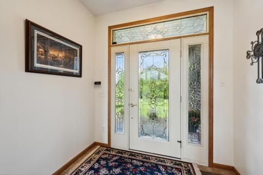 No excuse to not put out the holiday lights here! The foyer light switches control holiday light outlets, outlets by the flagpole and the outlet on the retaining wall. There is a brand new Bosch security system control panel here too.