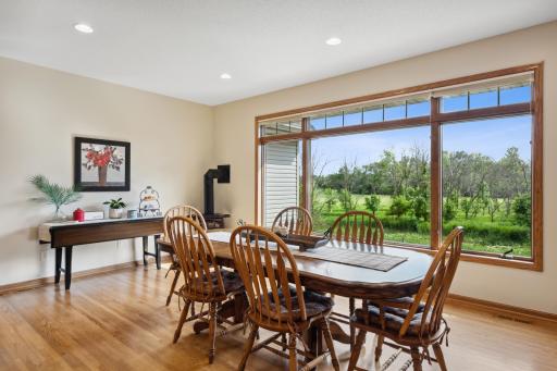 While enjoying time at dinner, look out the large windows and enjoy the property. Don't miss the gas fireplace in the corner, for that extra ambience or warmth when Old Man Winter returns.