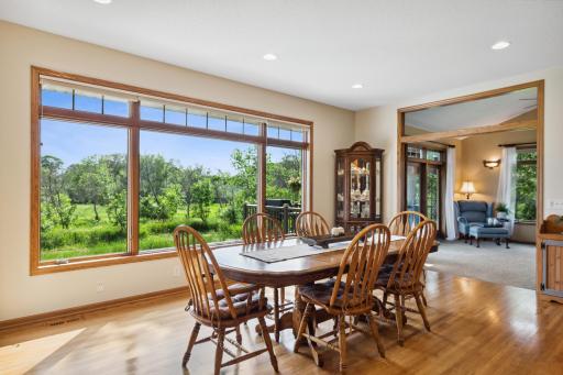 This space can flex between living room and informal dining room, and it's great for family meals and everyday dinners. And that view... stunning.