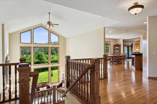 The solid oak floors start at the foyer and go though the kitchen for a cohesive look and feel. We know you're excited to go down that extra wide stairway into that gorgeous Great Room, but let's check out the rest of the main level first, shall we?