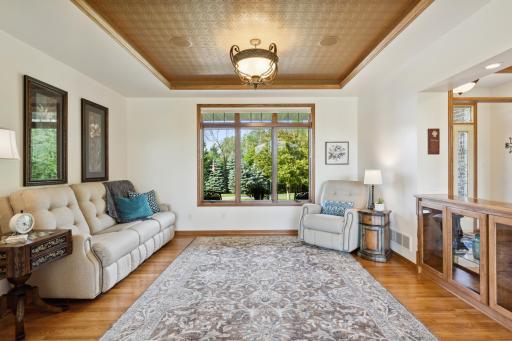 Enjoy dinner and conversation in the formal dining room. The space is plenty large for your holiday gatherings, and so close to the kitchen! Bon Appetit!