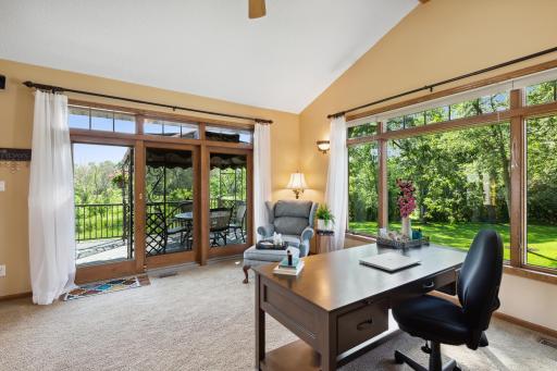 The 9' wide Andersen patio door with transom leads to the large composite deck.