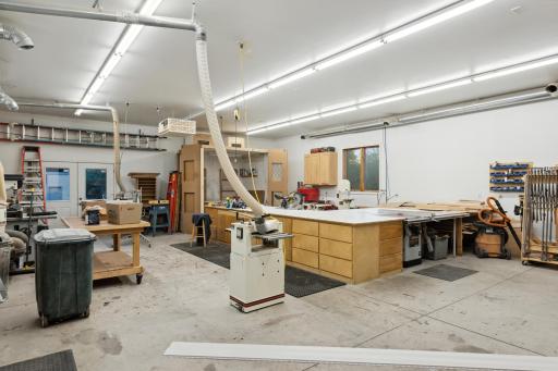 Gain entrance through the overhead door in the attached garage OR through one of two walk-through service doors.