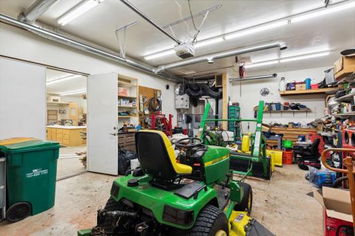 This garage space has a high-efficiency furnace, an air-exchanger, and running water. There are 50A and 30A circuits for a future welder and central AC too!