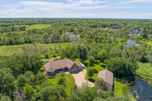 There are multiple ponds, a 30x60 shop/garage, and miles of trails on this little slice of paradise!