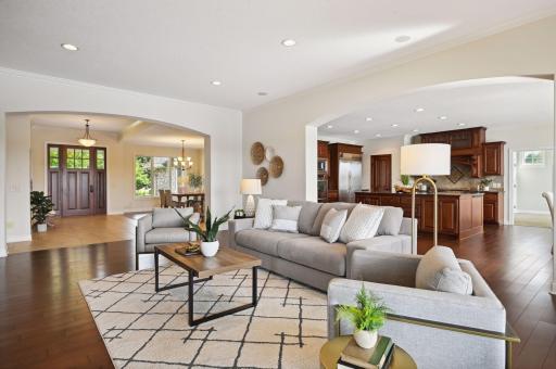 Formal living room open to dining and kitchen.jpg