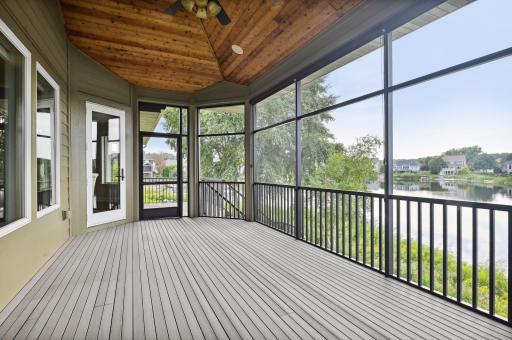 Screen porch walks out to deck and down to patio.jpg