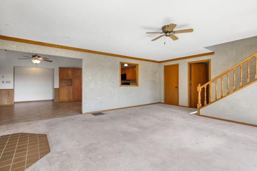Easy flow from the kitchen and dining spaces into the living room