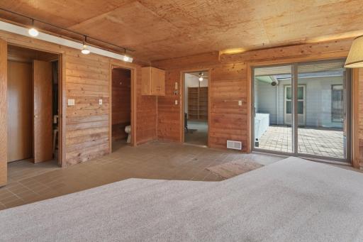 Spa room is located off the family room but also has patio doors to relax on your deck