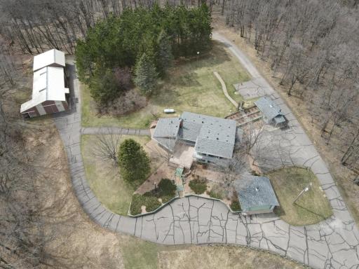 Property is complete with a 3 bed/3 bath home, 2 car garage, guest house and 2 pole buildings.