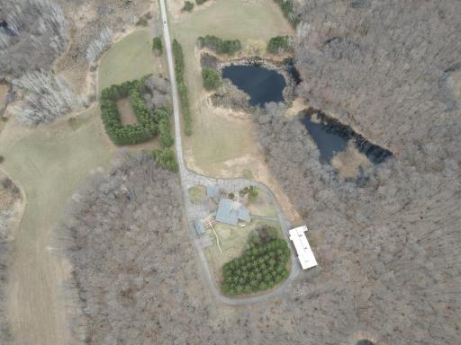 The property is heavily wooded, but also offers some open land