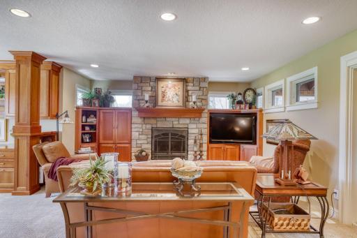 Gorgeous stone fireplace and media center.