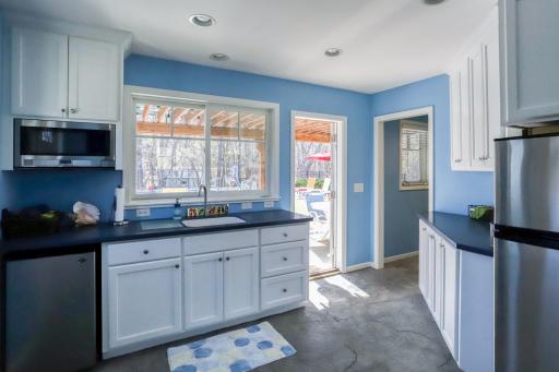 Pool house kitchenette - 3/4 bath through door.