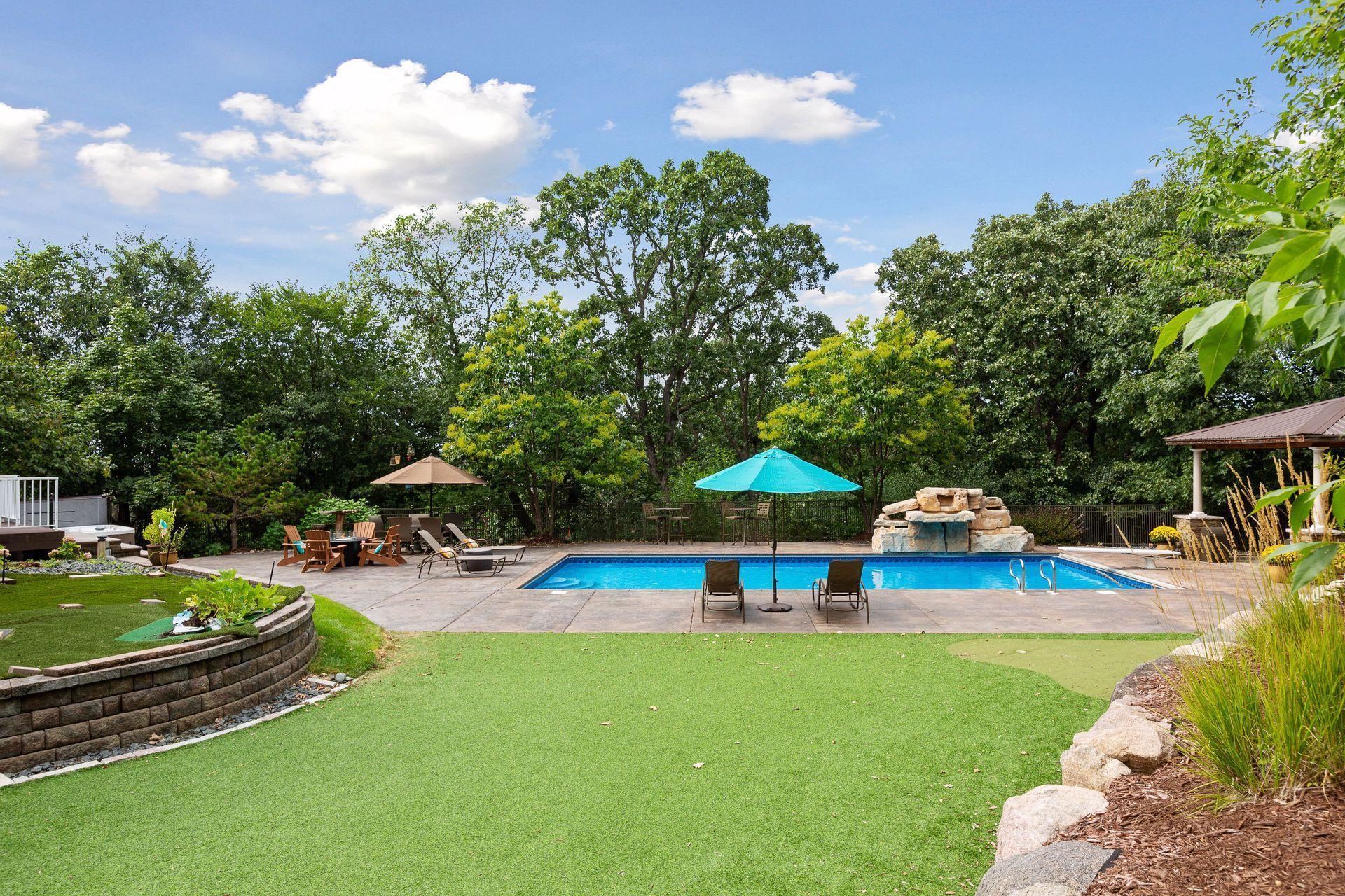 Enjoy the warmer months on the patio overlooking the sparkling pool.