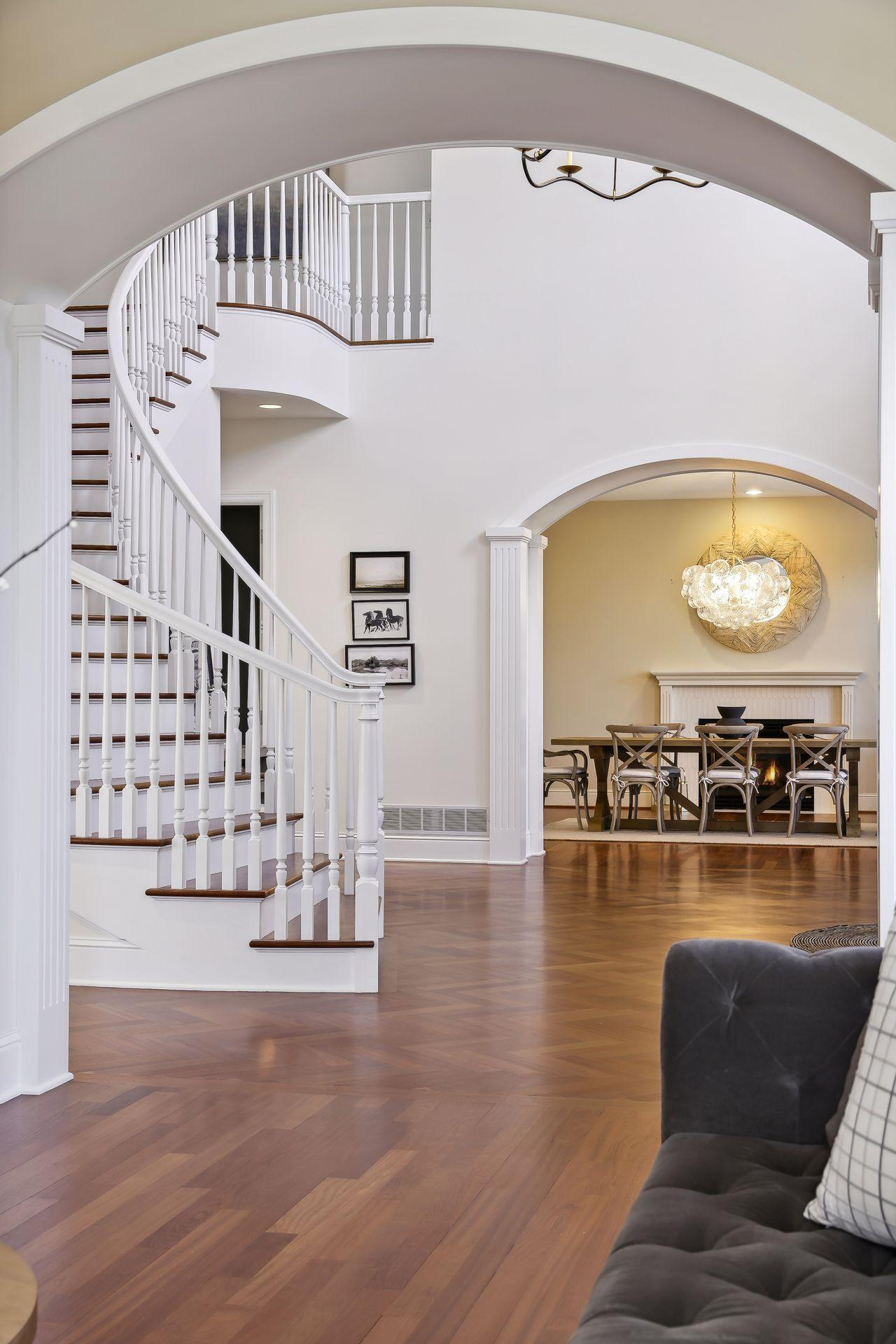 The spiral staircase leads to the four upper level bedrooms.