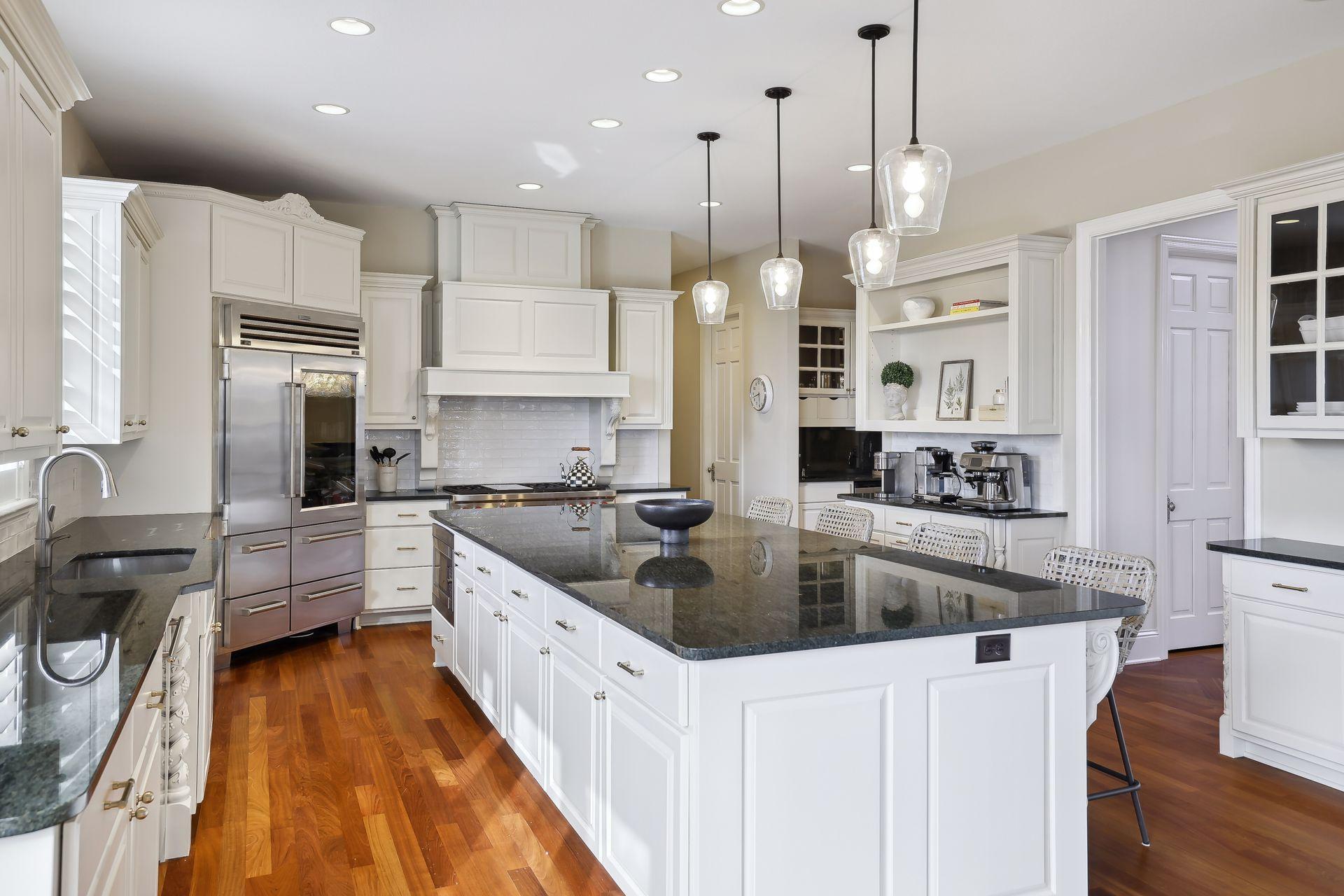 The chef will appreciate the functionality and flow of this gorgeous kitchen.
