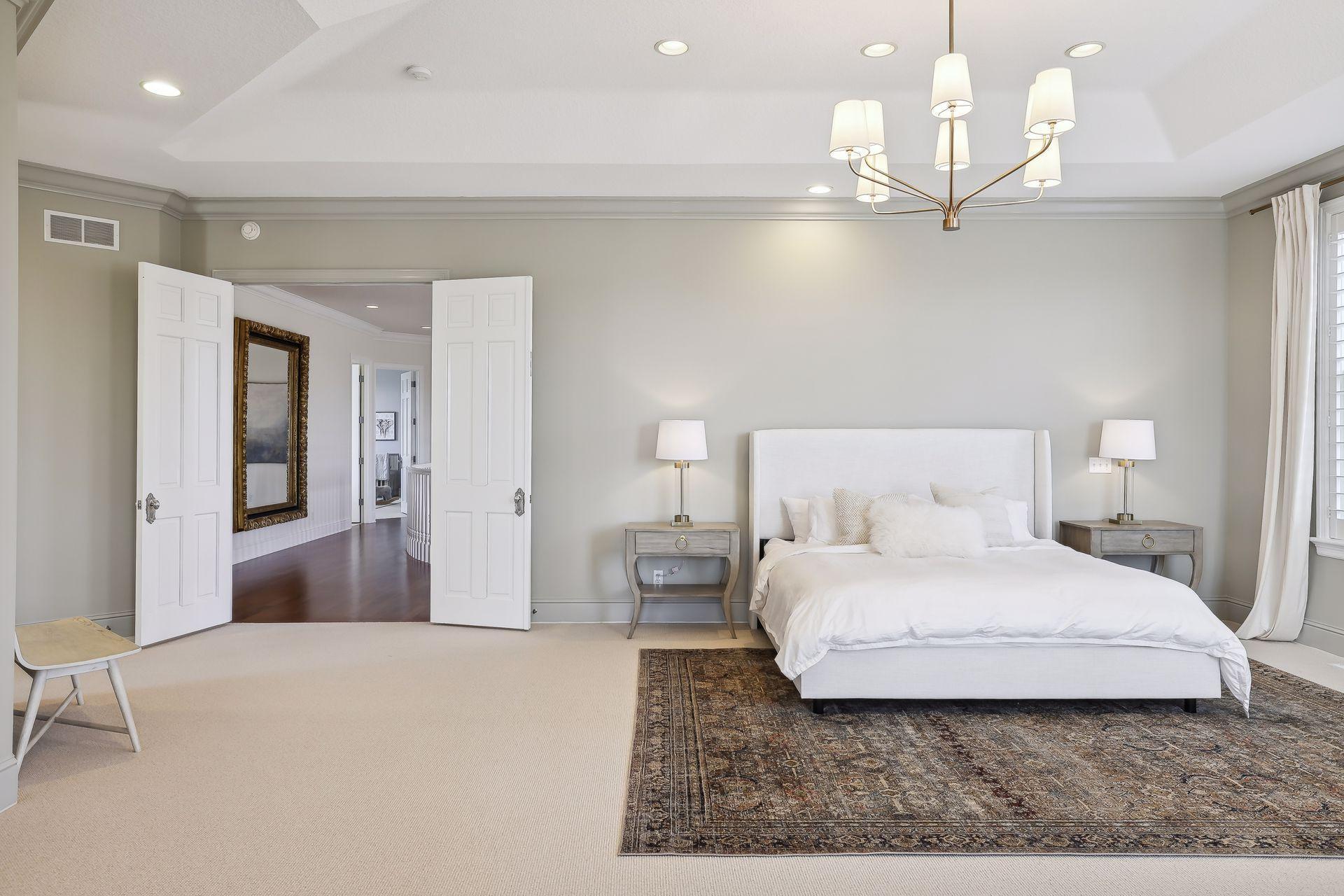 Retreat to the luxurious upper-level primary bedroom with fireplace, spa-like bathroom and private office.