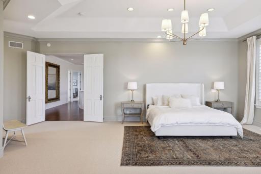 Retreat to the luxurious upper-level primary bedroom with fireplace, spa-like bathroom and private office.