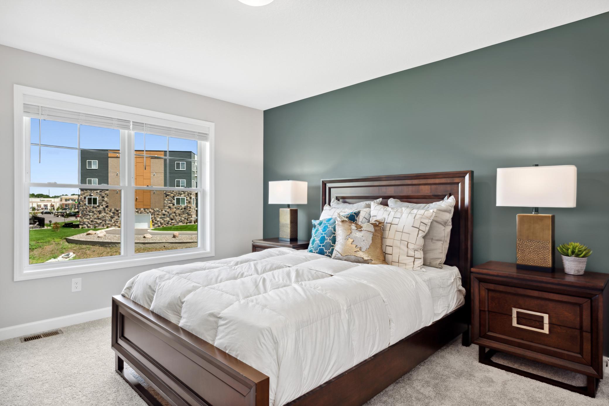 The lovely and spacious owner's bedroom features a 3/4 bath which walks through to a spacious walk in closet. *Please note, photos are of a model and are not the actual home, but very similar.