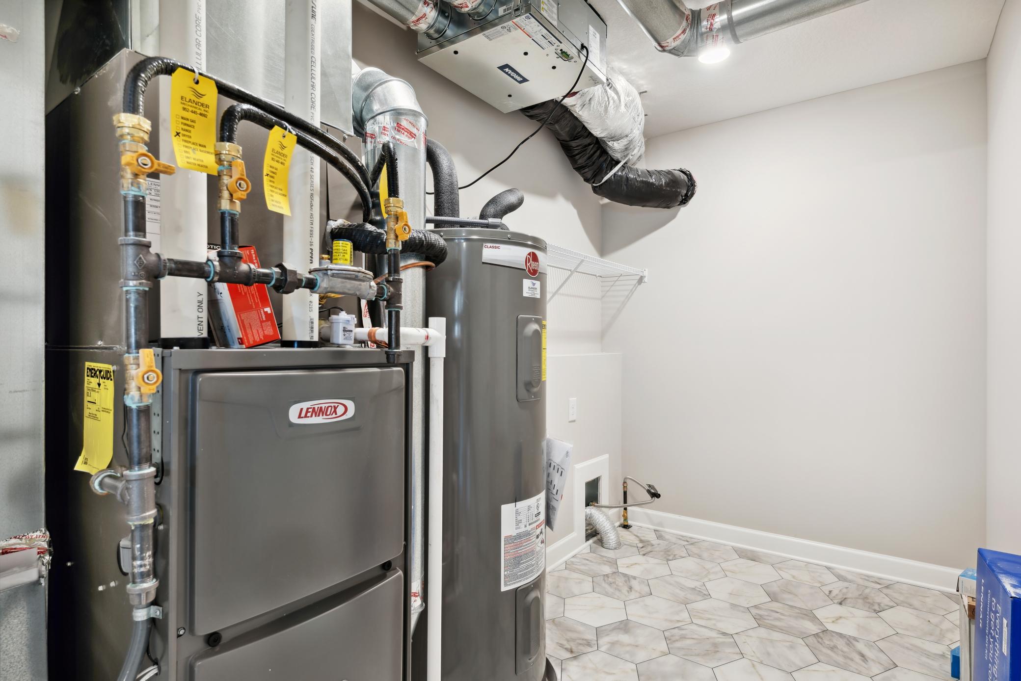 Convenient upper level laundry. *Please note, photos are of a model and are not the actual home, but very similar.