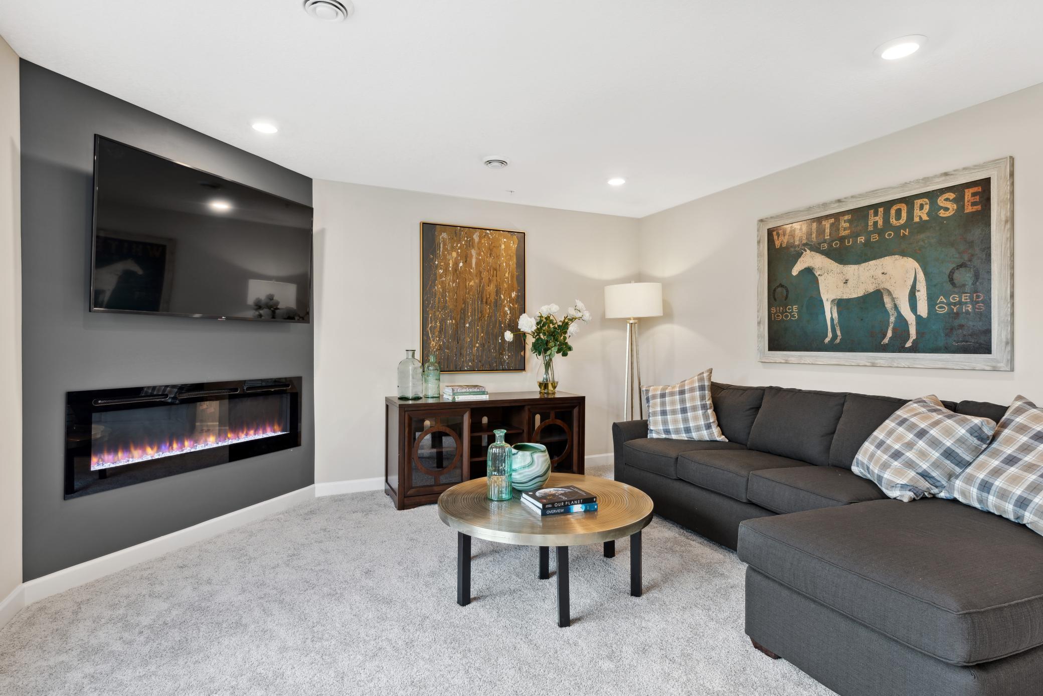 Every home comes with an electric fireplace with thermostat & blower and changeable flame colors!