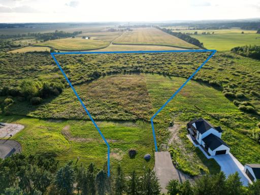 10.4 Acres in Sartell. Private Drive with 3 homes. Lot lines are approximate.