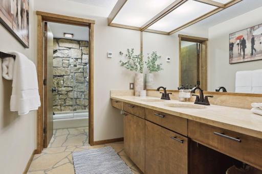 LL full bathroom w/one of a kind limestone shower