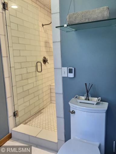 The flooring in this bathroom is marble tile and heated floors.