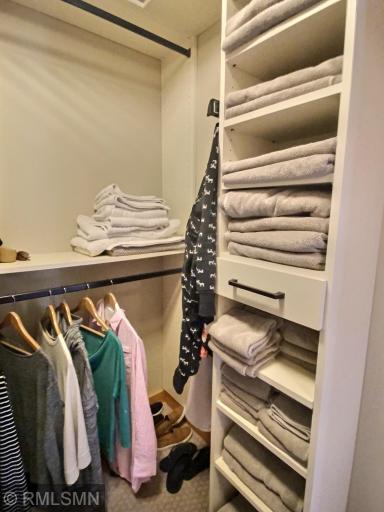 The closets have space saving pocket doors. Coordinating, like new towels and linens are included for each bed room and bathroom.