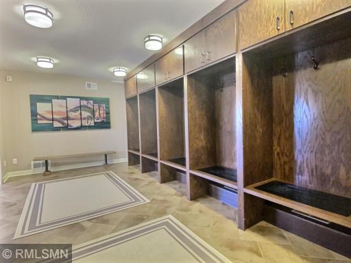 These cubbies are genius! Six individual spaces with hooks and cabinets to store you winter gear after a day of ice fishing or snowmobiling, or wet towels and swimsuits. Each cubby has a grated seat with a heat vent under each for quick drying.