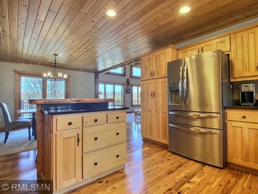 The Frigidare Galley refrigerator is awesome with it's flex temp drawer, french door and freezer draw with 2 interior drawers. The adjacent pantry has slide-out shelves. The center island is great for an additional prep area and seating.