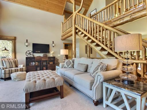 Living rooms should be comfortable, and this one screams cozy! The eye pleasing gray tones create soft and relaxing environment.