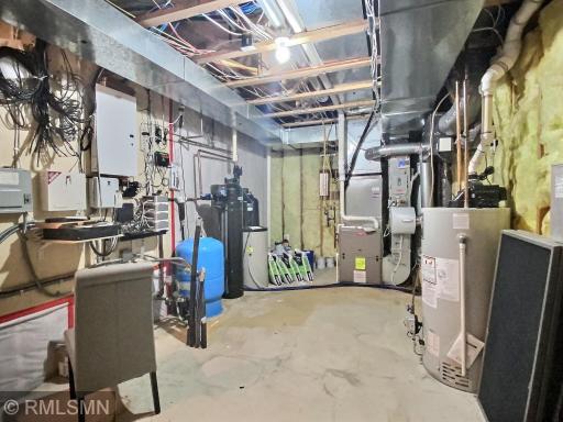 Home to the Step Warm electric heated floor mechanics, Wright Hennepin Security System, Rainbird sprinkler system, Kinetico water filtration & softener, Coleman furnace, Venmar air filter, 50 gallon Defender water heater and Sonos sound system.