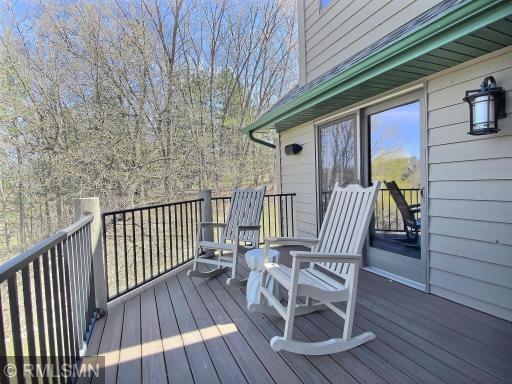 The deck spans the entire lake side of the house. This seating arrangement is just outside the primary bedroom.