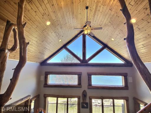 The natural logs the adorned the staircase are absolutly stunning. ANd those windows! WOW!