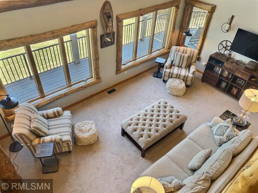 Looking down from the loft. Remember, EVERYTHING in this spectacular home will be included int he sale. (except for docks, lifts and any watercraft items)