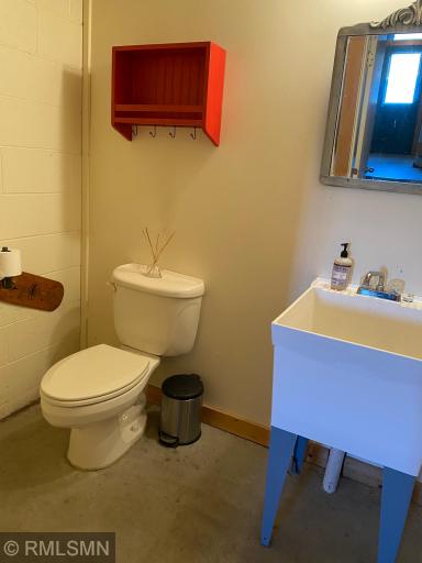 There is a breeze way between the tuck under garage and the house which includes a 1/4 bath room so you and your guests can use the facilities with out walking through the house with wet, sandy feet!