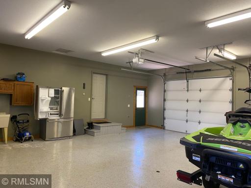 The property is connected to a "Best Smart" Security Alarm & Monitoring System that controls garage service door, overhead garage doors, security system for the house & garages, temperature control for all 3 levels of the home and a number of lights.
